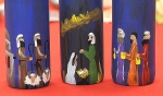 Nativity scenes are painted on beer bottles in these Columbian pieces of art. (Dan Cappellazzo/Staff Reporter)